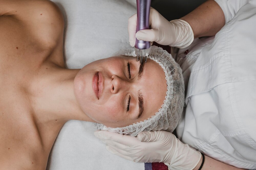 Beautiful young woman having a cosmetic treatment