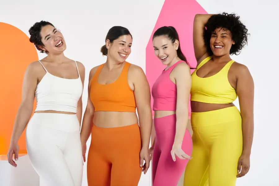 Women posing at studio medium shot