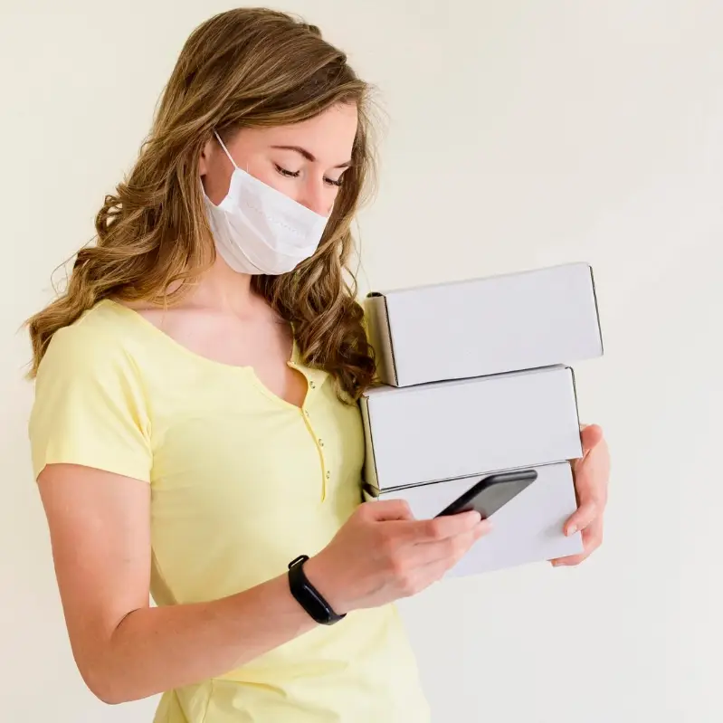 Front view woman holding products bought online